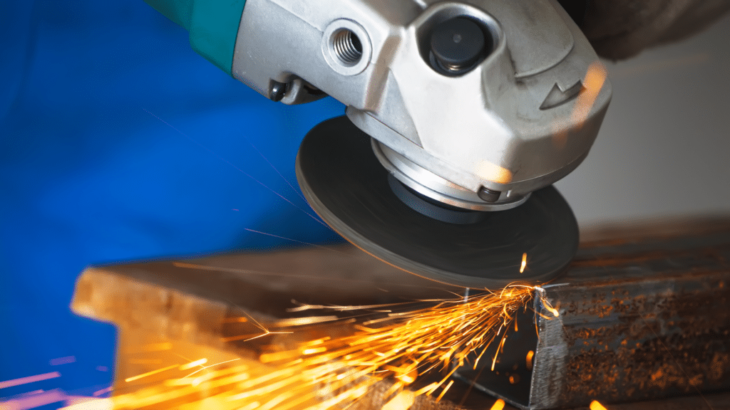 Angle grinder cutting metal